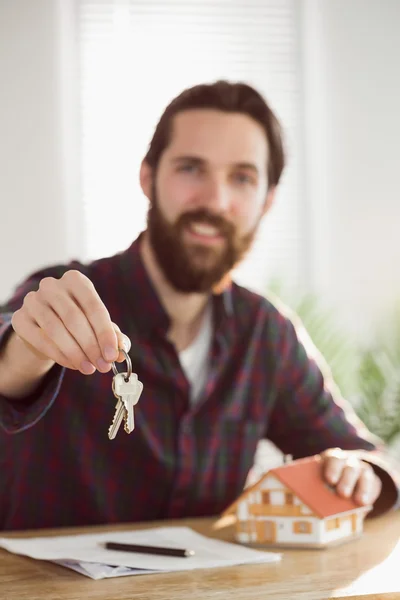 Hipster businessman applying for a mortgage — Stockfoto