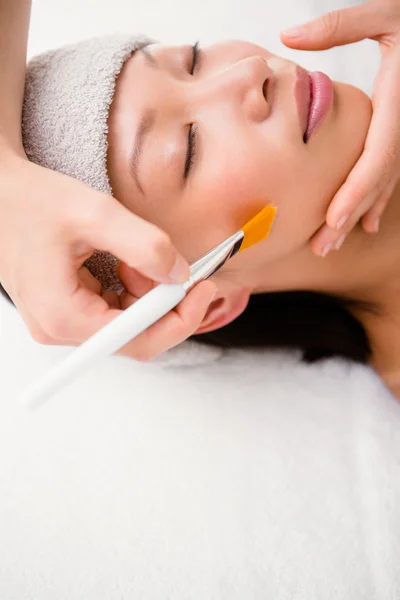 Attractive woman receiving massage — Stock Photo, Image