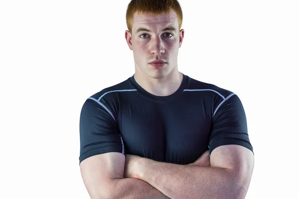 Musculoso jugador de rugby con los brazos cruzados —  Fotos de Stock
