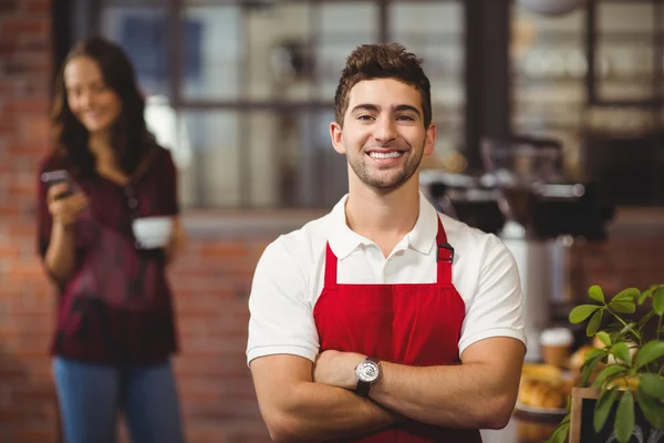 Handsome waiter with arms crossed — Stock Photo, Image