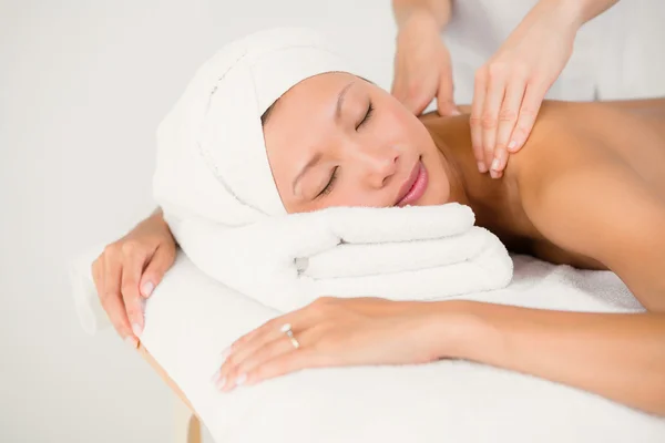 Attractive woman receiving back massage — Stock Photo, Image