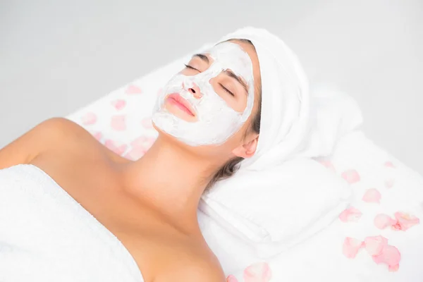 Woman having white cream on face — Stock Photo, Image