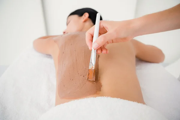 Brunette enjoying chocolate treatment — Stock Photo, Image