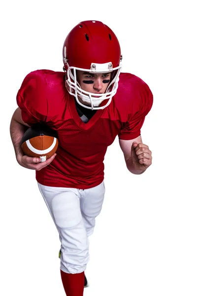 Jogador de futebol americano correndo com a bola — Fotografia de Stock