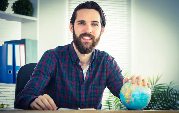 Hipster businessman with a globe — Stock Fotó
