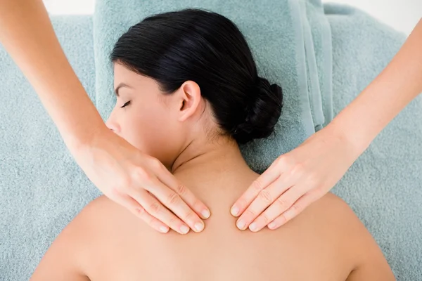 Brunette on massage table — Stock Photo, Image