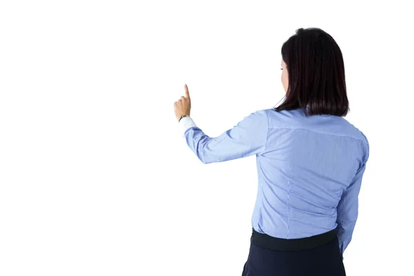 Businesswoman standing and pointing — Stock Photo, Image