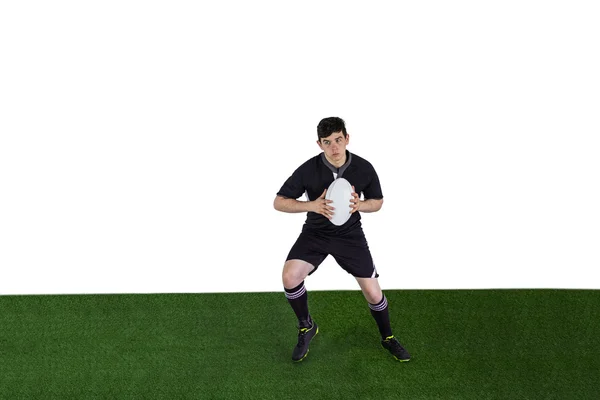 Ragbyový hráč běží s rugby míč — Stock fotografie
