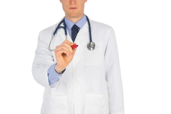 Serious doctor writing with marker — Stock Photo, Image