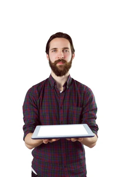 Handsome hipster showing tablet pc — Stok Foto