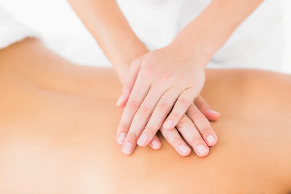 Woman receiving back massage — Stock Photo, Image