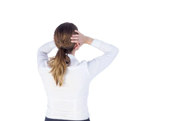 Stressed businesswoman with hands on her head — Stock Photo, Image