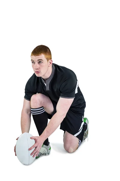 Jugador de rugby listo para hacer una patada —  Fotos de Stock