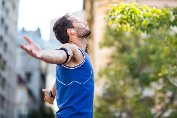 An handsome athlete enjoying the sun — Stock Photo, Image