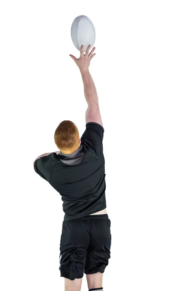 Rugby player catching a rugby ball — Stock Photo, Image