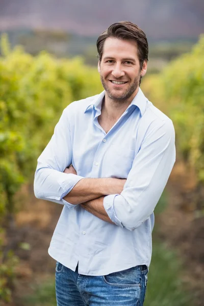 Happy vintner with crossed arms — Stock Photo, Image