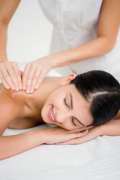 Brunette enjoying massage — Stock Photo, Image