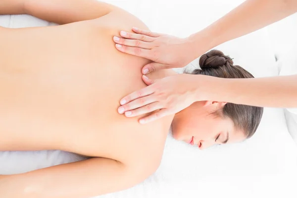 Brunette enjoying back massage — Stock Photo, Image