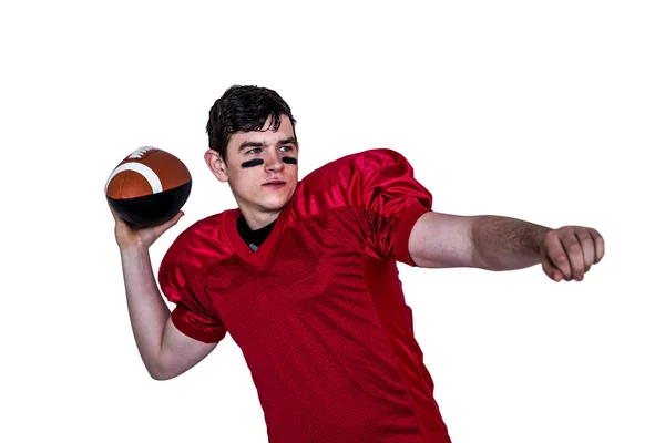 American Football Spieler wirft einen Ball — Stockfoto