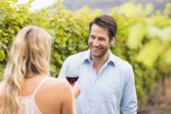 Young happy man smiling at woman — Stock Photo, Image