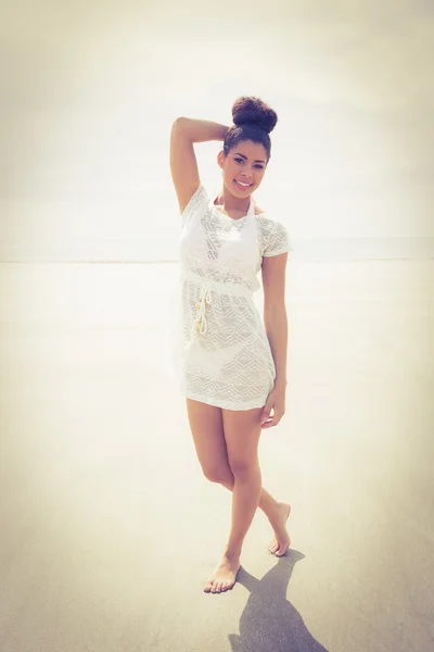 Stylish girl posing on the sand — Stock Photo, Image