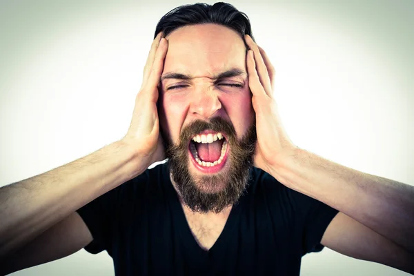 Handsome hipster shouting at camera — Stock Photo, Image