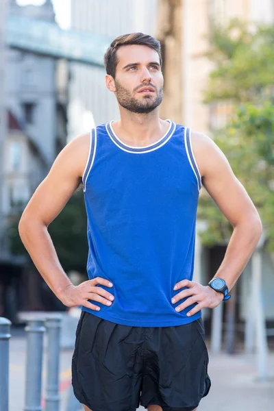 An handsome athlete looking away — Stock Photo, Image