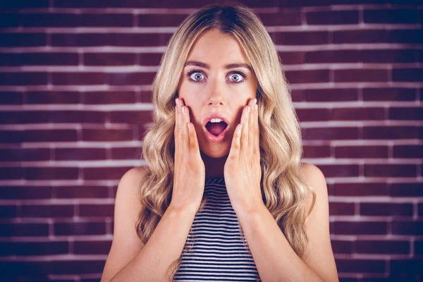 Blonde woman being shocked — Stock Photo, Image