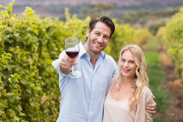 Happy couple smiling at camera — Stock Photo, Image