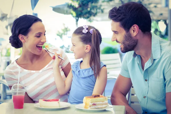 A family eating at the restaurant — Stock Photo, Image