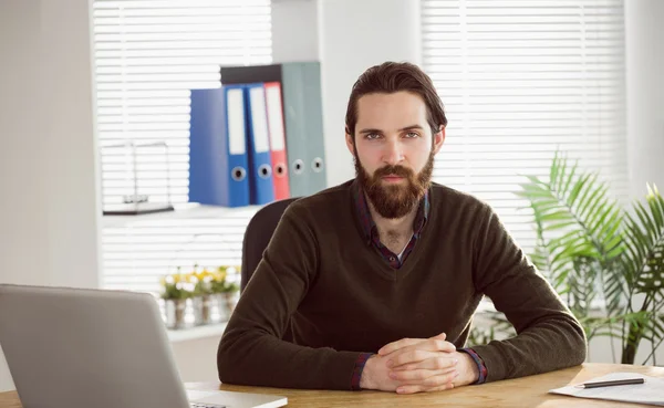 Hipster businessman frowning at camera — Stock Photo, Image