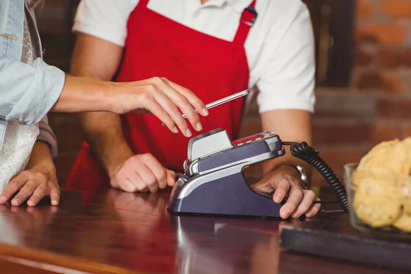Customer making a mobile payment — Stock Photo, Image