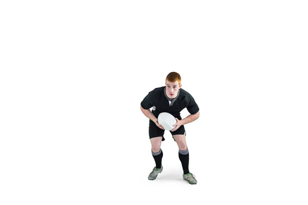 Rugby player działa z rugby piłka — Zdjęcie stockowe