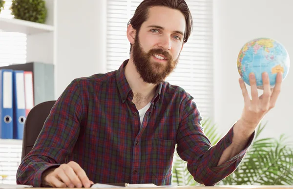 Hipster businessman with a globe — Stock Photo, Image