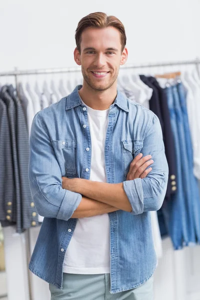 Portrait of a happy smiling man with his arms crossed — Stock Photo, Image