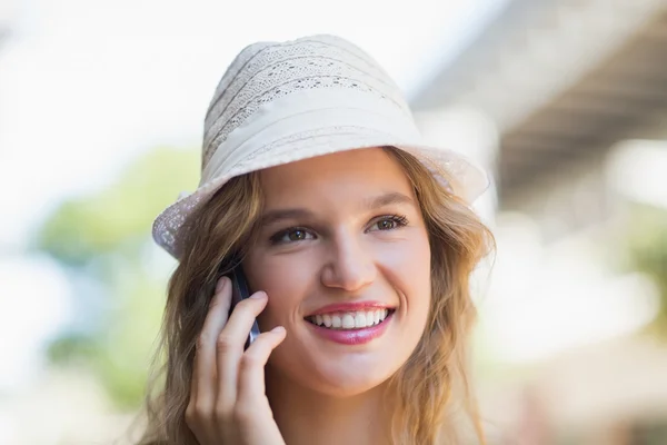 Pretty smiling woman on the phone — Stock Photo, Image