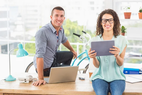 Smiling creative business team looking at the camera — Stock Photo, Image