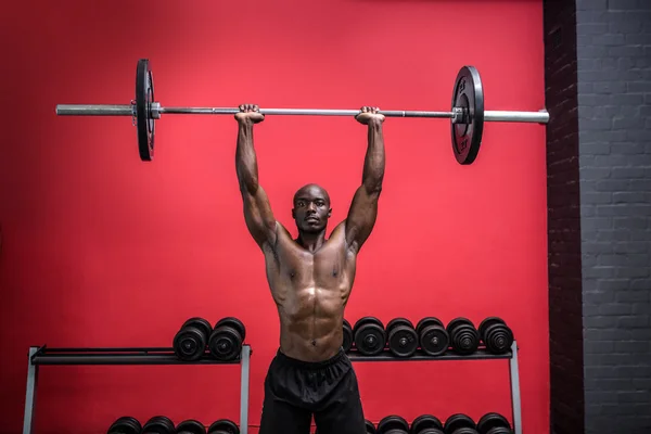 Young Bodybuilder doing weightlifting — Stock Photo, Image