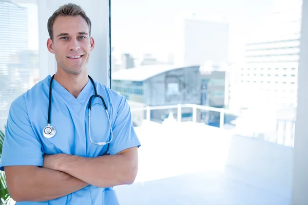 Smiling doctor looking at the camera — Stock Photo, Image