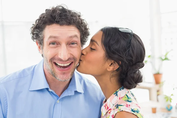 Portrait of a smiling casual young couple at work — Stock Photo, Image