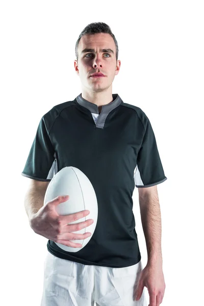 Jogador de rugby segurando uma bola de rugby — Fotografia de Stock