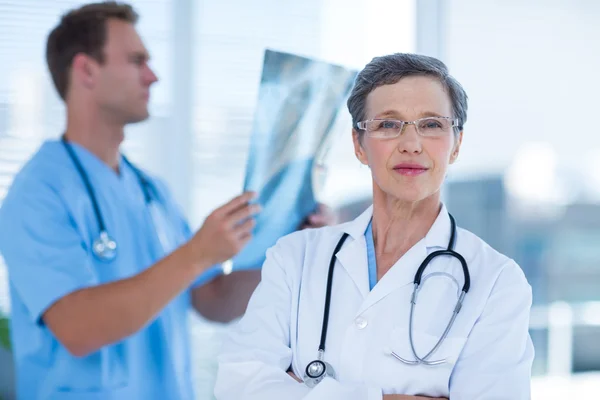 Attentive doctor looking at the camera — Stock Photo, Image