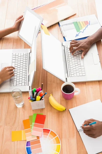 Business people working at laptops — Stock Photo, Image