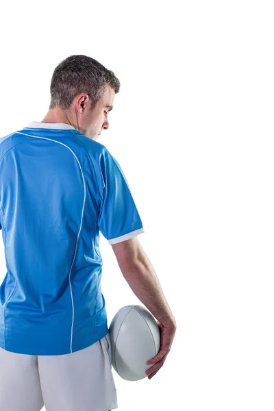 Rugby player holding a rugby ball — Stock Photo, Image