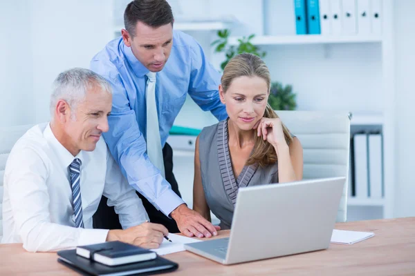 Business partners working on laptop — Stock Photo, Image