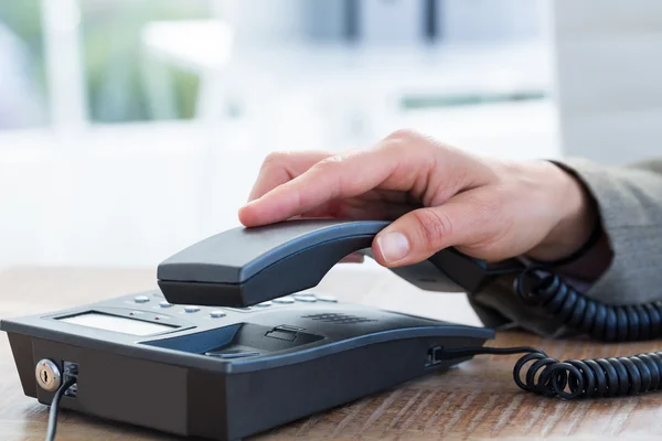 Businessman answer the phone — Stock Photo, Image