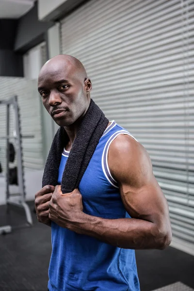 Young Bodybuilder in shirt looking at the camera — Stock Photo, Image