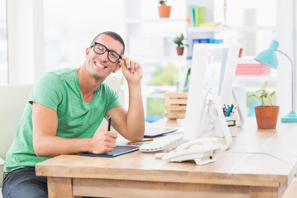Young creative businessman working on the computer — Stock Photo, Image