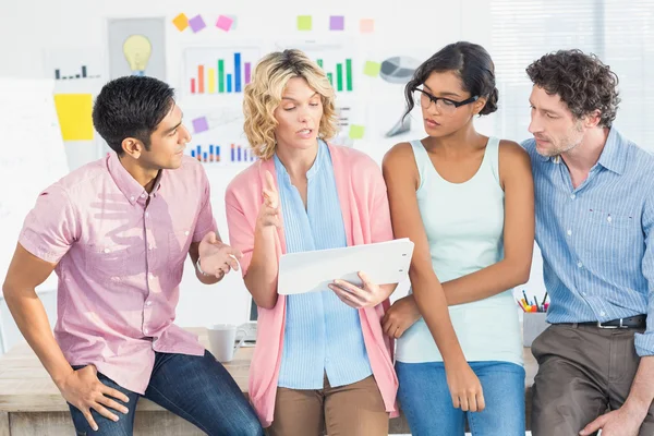 Casual businesspeople using tablet — Stock Photo, Image