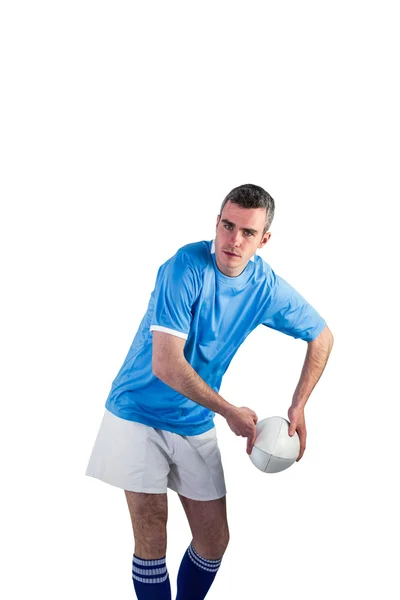 Rugby player about to throw rugby ball — Stock Photo, Image